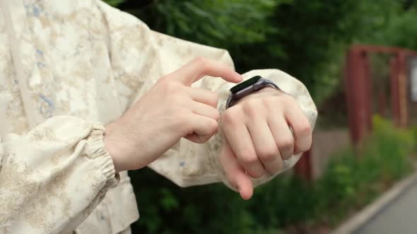 Smart Watch on a Man's Hand alt