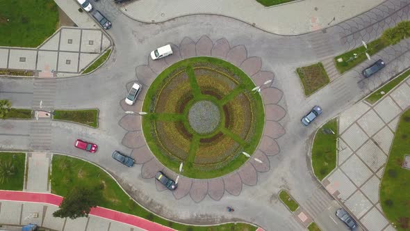 Cars Are Moving In A Circular Motion Top View. Roundabout Cars