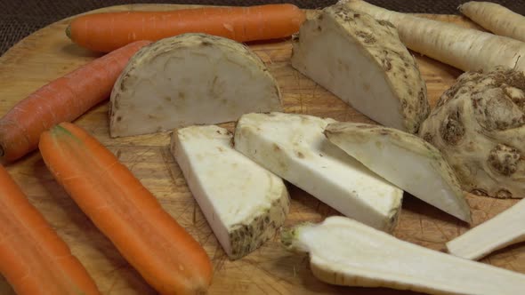 Mix of fresh vegetables on a wooden board, healthy food