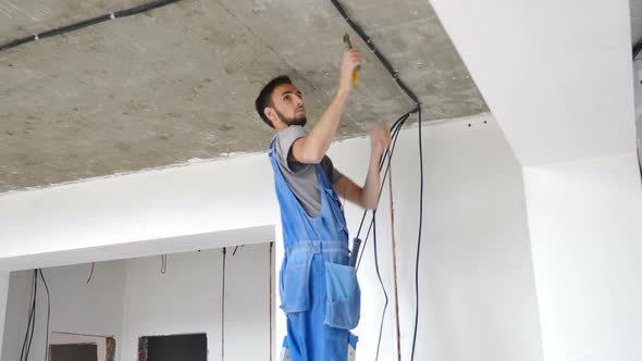 Installation of Electrical Wiring on Apartment Ceiling alt