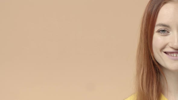 Closeup Halfface of Enthusiastic Gorgeous Redhead Woman with Beaming Joyful Smile Looking Camera alt