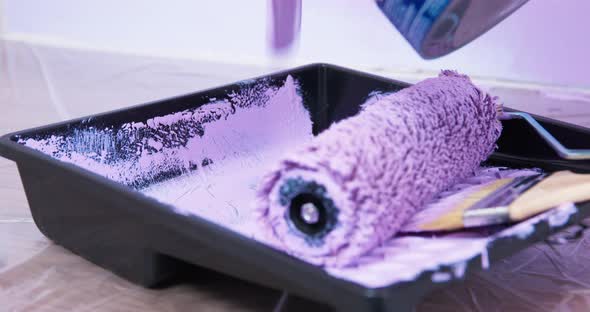 Purple Paint Pours to Paint Cuvette From the Jar Fiber Roller and Brush Prepared to Work Floor is