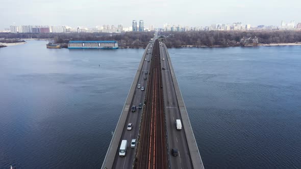 Subway Train in Motion at the Metro Bridge. View of the Left Bank of Kiev alt