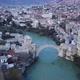 Aerial Drone View Of City Of Old Bridge And Neretva River In Mostar - VideoHive Item for Sale