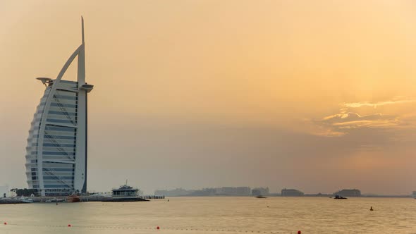 Dubai Skyline with Burj Al Arab Hotel During Sunset Timelapse alt