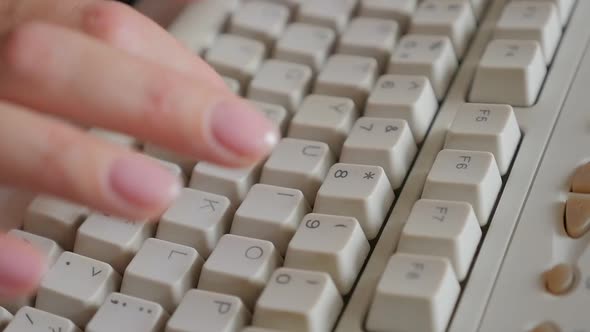 Woman typing on computer  keyboard slow motion 1080p HD footage - Slow motion typing on PC  beige ke