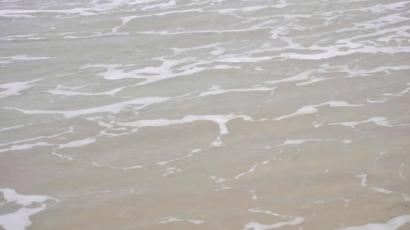 Waves on a Sandy Beach alt