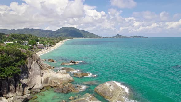 Beautiful 4K drone footage of the beach and unique rock features at Hin Ta Hin Yai Beach on Koh Samu alt