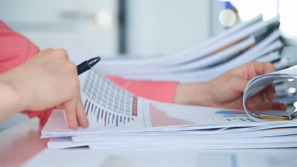 Businesswoman Corrects Business Report alt