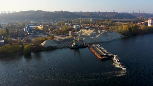 Cargo Ship Barge Loaded with Sand at Autumn