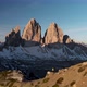 Aerial Man Hiker Walk In Front of Cadini Mountain in Dolomites Italy - VideoHive Item for Sale