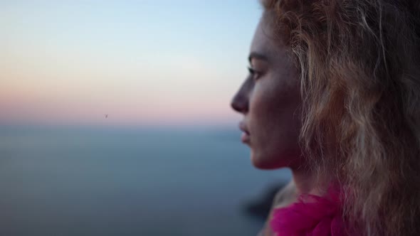 Abstract Defocused Shot of Beautiful Young Caucasian Woman with Curly Blond Hair and Freckles alt