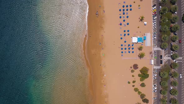 Top View of Las Teresitas Beach, Road, Cars in the Parking Lot, Golden Sand Beach and the Atlantic alt