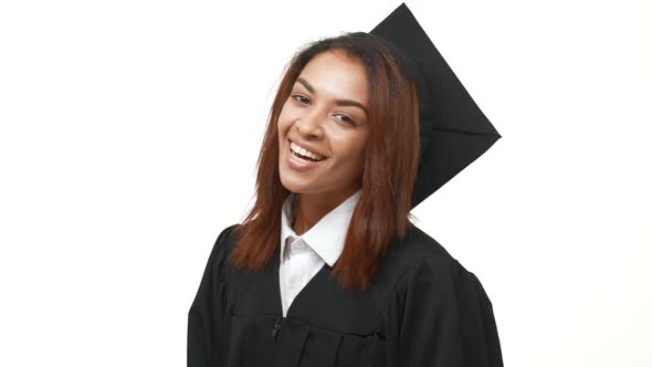 Smiling Happy Beautiful African American Female Graduate Showing Ok Over White Background in alt