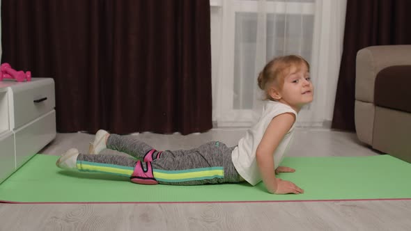 Child Kid Training Gymnastics Stretching Workout at Home Children Girl Making Sport Exercises, Stock Footage
