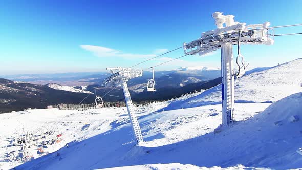 Icecoated Ski Lift in Carpathian Mountain alt