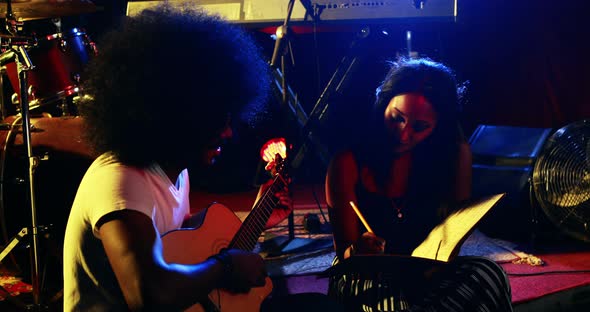 Couple rehearsing music on concert 4k alt