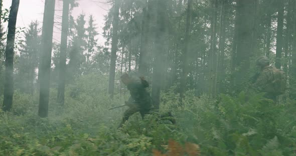 Millitary Action in Dense Forest Running After Terrorist Concept of War and Terrorism alt