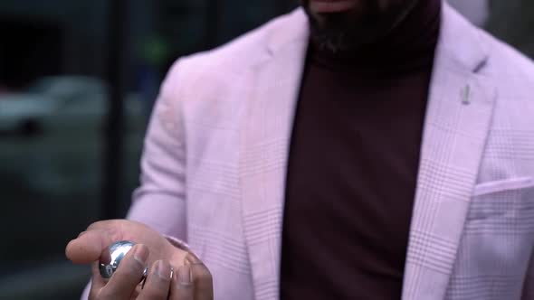 Portrait of a Bearded AfricanAmerican Man in a Pink Jacket alt