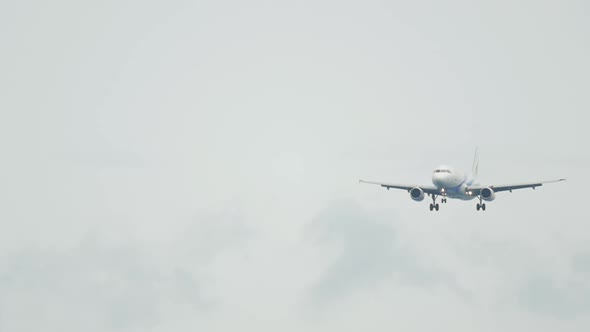 Airplane Flying in Heavy Rain alt