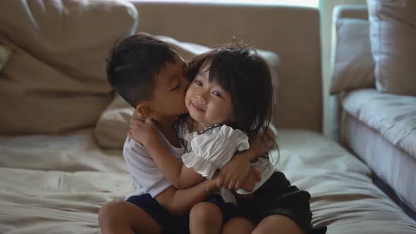 Two Asain boy and girl happy alt