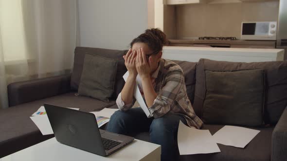 Female Manager Overworking at Home Crying Throwing Papers in the Air alt