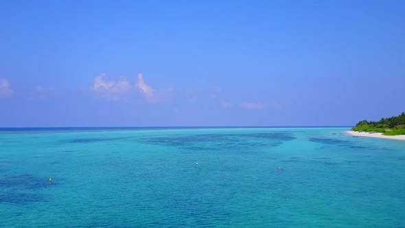 Aerial drone travel of marine shore beach by sea with sand background alt