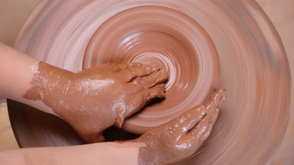 Top View Wheel Potter Hand Clay Shaping