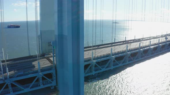 Aerial Drone Shot Ascending Up the Side of a Verrazano Bridge Tower in New York alt