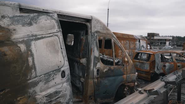 Burnt Civilian Car on the Bridge
