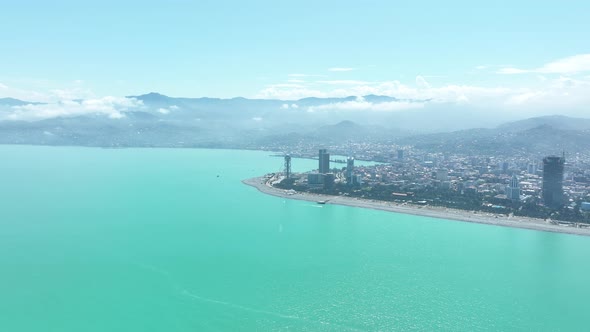 Aerial shot of modern buildings in downtown of Batumi. Cityscape of Batumi city, Georgia 2022 alt