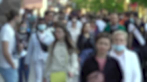 Silhouettes of People Walking in a Crowd Slow Motion alt