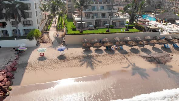 Aerial drone footage of the beautiful beach and coastal area of Puerto Vallarta in Mexico alt