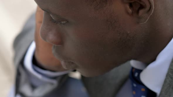 find solutions, reasoning. thoughtful black african businessman thinking alt