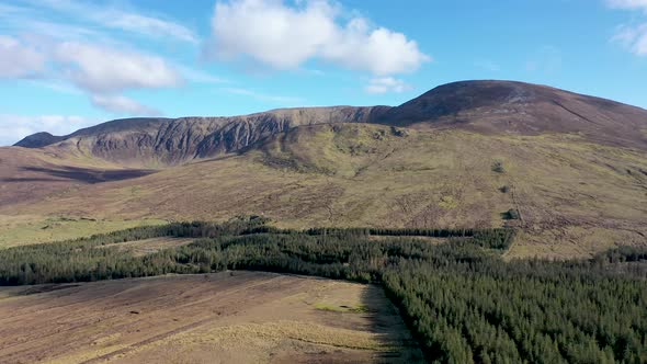 Aerial View of the Beautiful Coast at Malin Beg with Slieve League in the Background in County alt