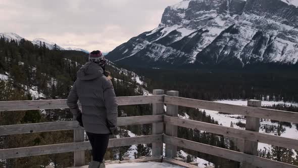 Young Female Hiker Discovering a Stunning Lookout of Mount Rundle in Banff Alberta Canada, Wide Angl alt