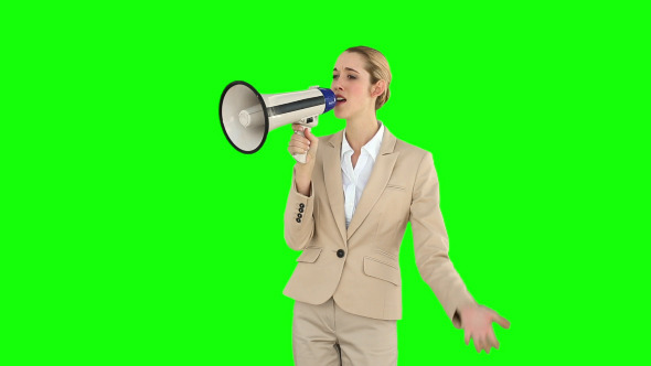 Positive Businesswoman Shouting In To Megaphone 1