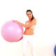 Fit Model Sitting On Exercise Ball Lifting - VideoHive Item for Sale