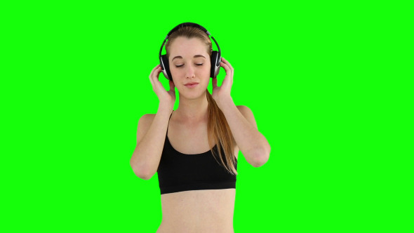 Fit Model Listening To Music And Smiling 1