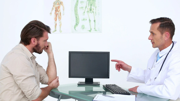 Patient Talking With His Doctor About Injury