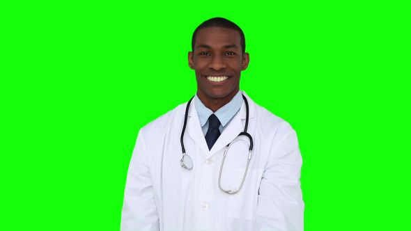Happy Young Doctor Showing Camera An Apple 4