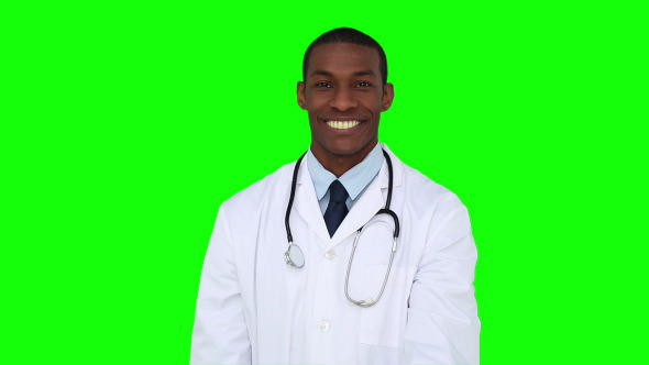 Happy Young Doctor Showing Camera An Apple 4 alt