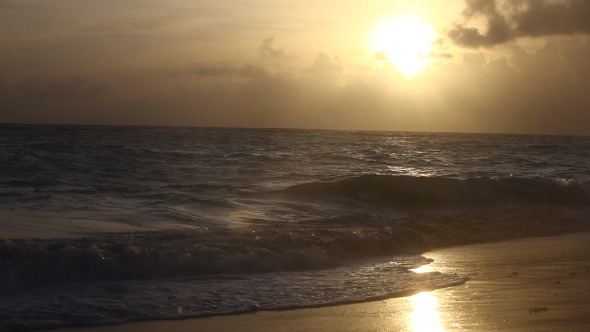 Beautiful Waves On Beach At Sunset