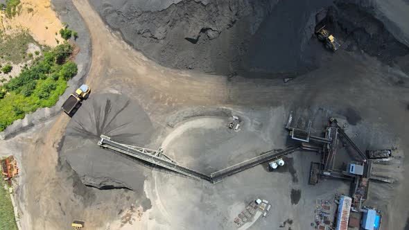 Aerial of Asphalt and Cement Factory Large Piles of Construction Rocks Used for Asphalt Production alt