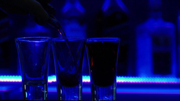 Pouring Three Shots of Clear Alcoholic Drink-2 alt