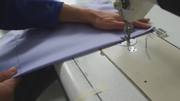 Worker at the sewing machine alt