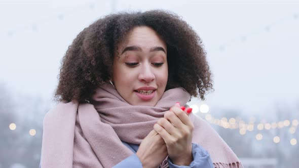 Portrait of Afro American Girl with Curly Hairstyle Feels Cold Standing Alone at City Street in alt