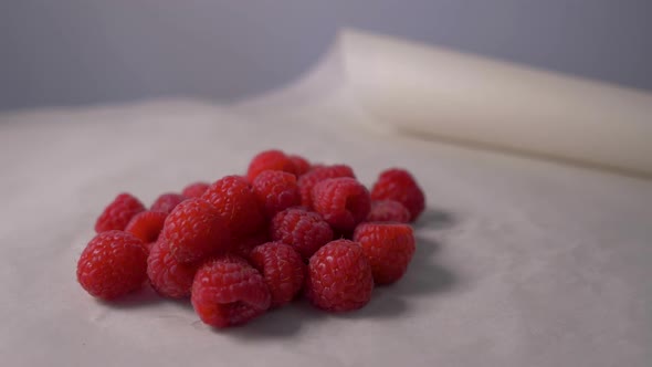 Fresh Raspberries Rotation in . Fresh Raspberries on the Table. Camera's Rotate alt