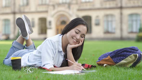 Happy Asian Student Woman Outdoors