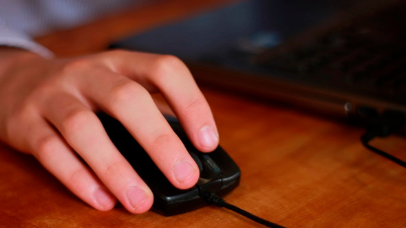 Hand Clicking Computer Mouse